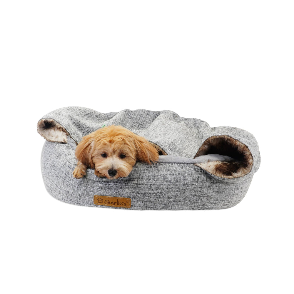 Small Pet comfortably sleeping in Charlie's Snookie Hooded Pet Bed – Light Grey.