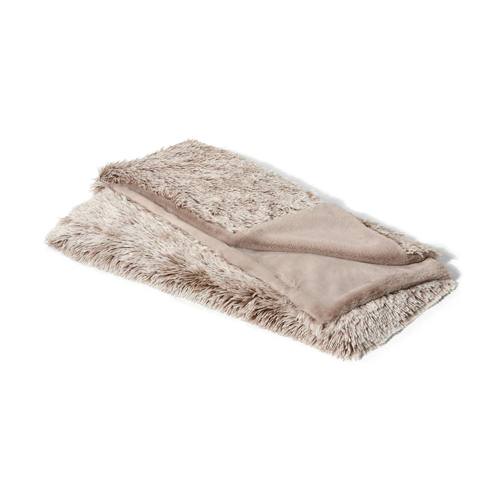 Display of the Snooza Calming Cuddler Blanket in Mink showcasing both sides. The image highlights the luxurious long-pile fabric and high-quality materials used in its construction.