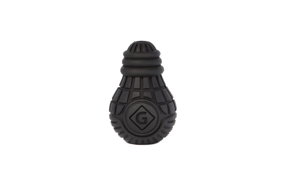 Large, black GiGwi Treat Dispensing Bulb outside of packaging on a white background, highlighting its unique bulb shape and textured grooves.