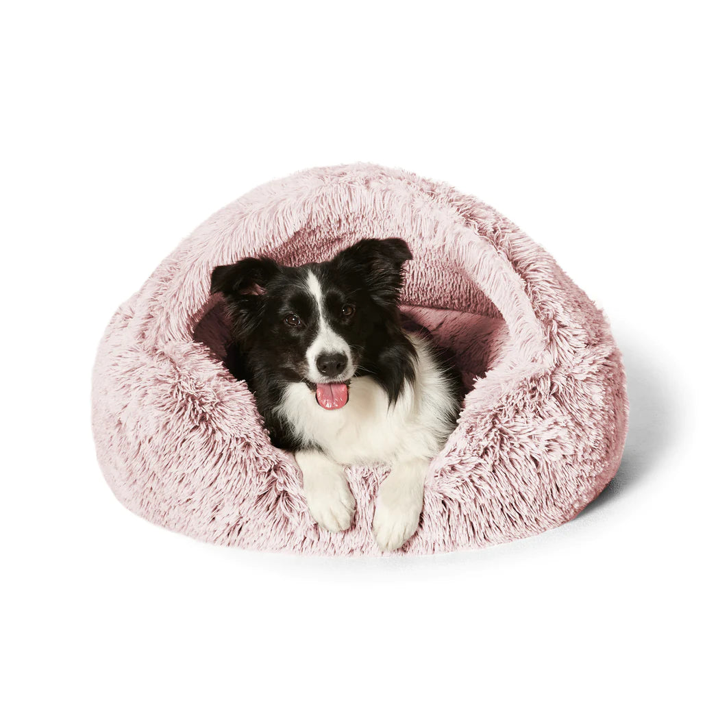 Dog burrowing in the Snooza Calming Hoodie Cuddler – Bliss, showcasing the cozy cave-style pocket