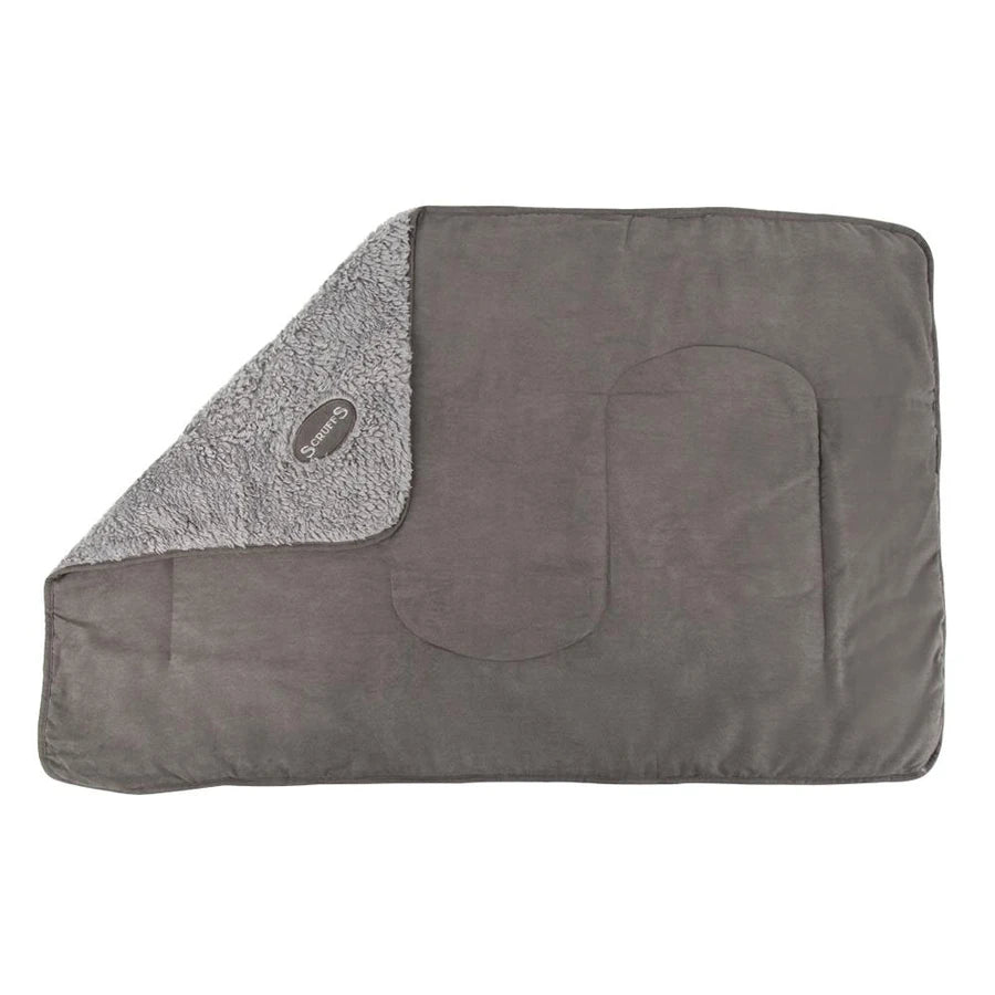 The reverse side of the Scruffs Cosy Blanket, displaying the faux suede material.