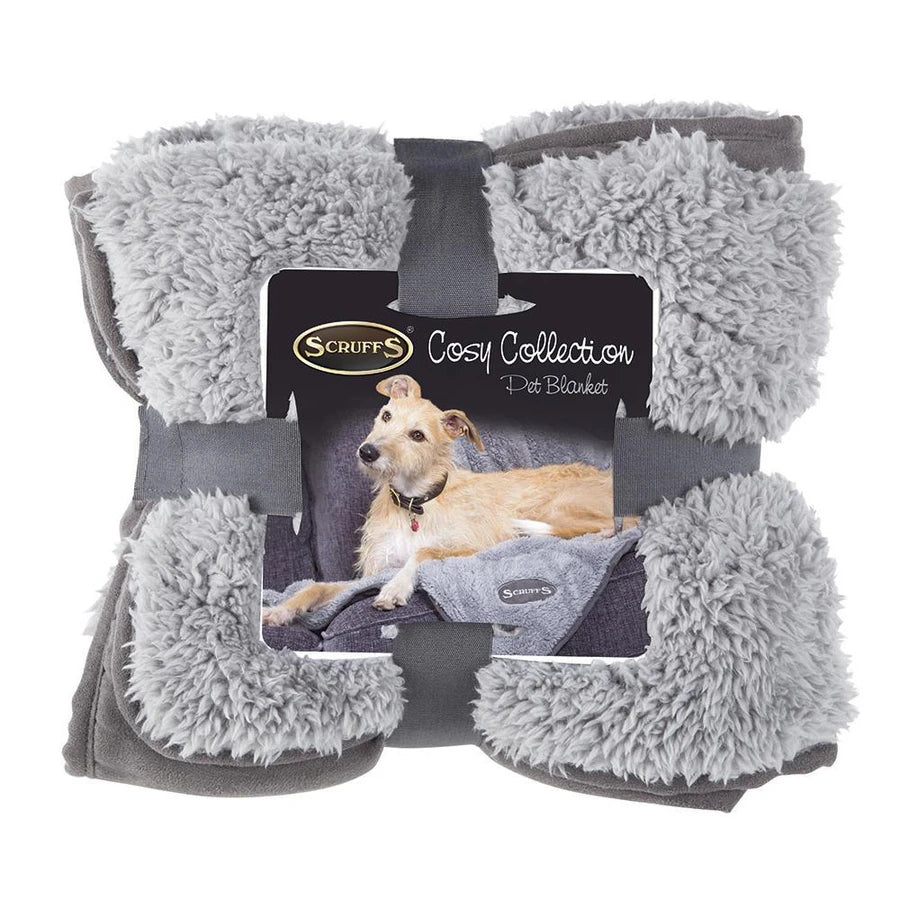 Packaging of Scruffs Cosy Blanket in Grey, featuring a reversible design with faux suede and plush materials. Size: 110 x 72 cm.