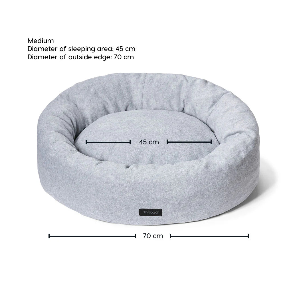 The medium-sized Snooza Self-Warming Polar Fleece Cuddler bed in Glacier grey, with its dimensions labeled on a white background.