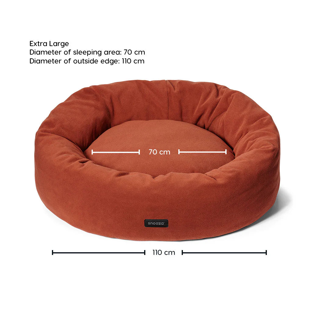 Extra-large Snooza Self-Warming Polar Fleece Cuddler in Rust with dimensions displayed on a white background.