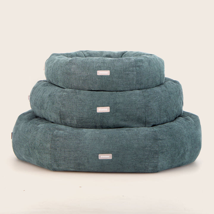 Snooza Panelled Cuddler Amazon Dog Beds stacked in all sizes – front view showcasing structured panel design and soft plush fabric.