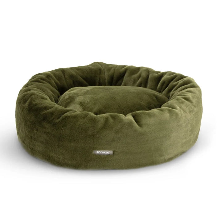 Frontal view of the Leaf Snooza Luxe Fur Cuddler, highlighting the Snooza logo and the bed's plush, rounded design.