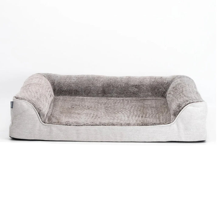 Front view of the Snooza Ortho Dream Sofa in Cashmere, showcasing plush fabric and side bolsters