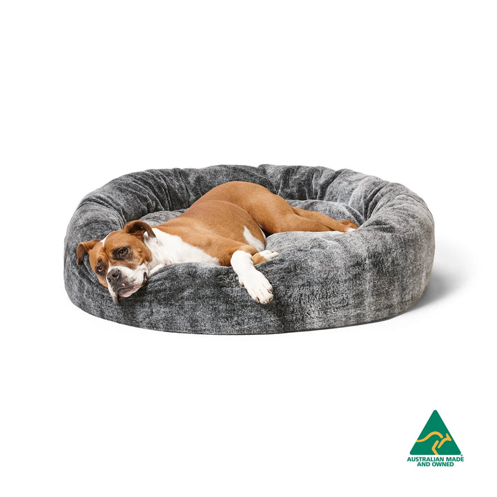 Boxer Dog Relaxing on Snooza Chinchilla Cuddler Pet Bed