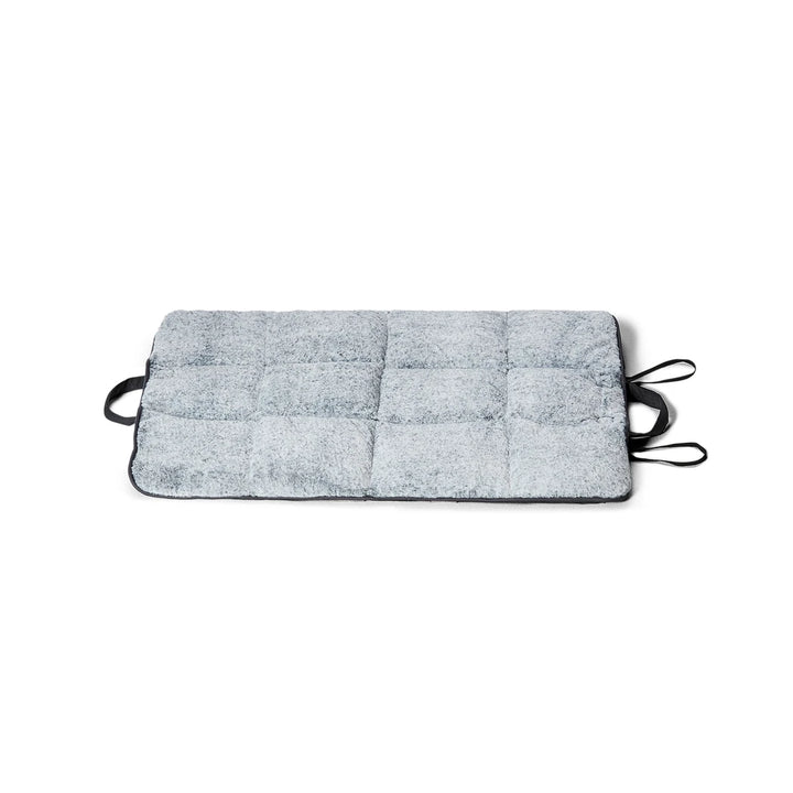 Fully extended Snooza Travel Mat in Charcoal, highlighting the plush faux fur upper side and durable exterior.